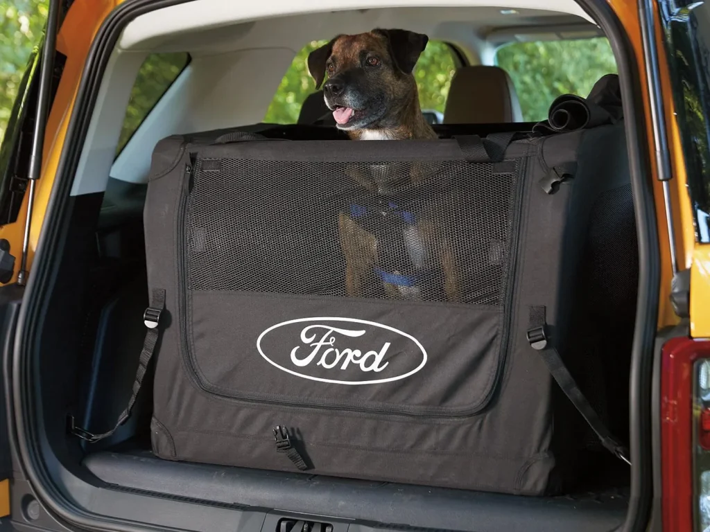 Dog in the back of a Ford Bronco Sport in Ford's portable soft-sided Pet Kennel